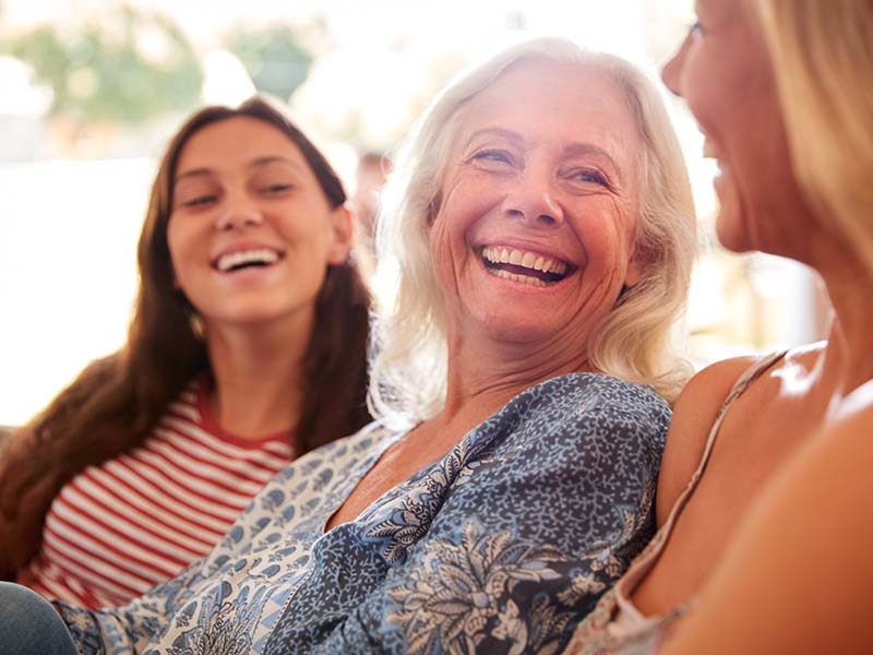 Three generations smiling together
