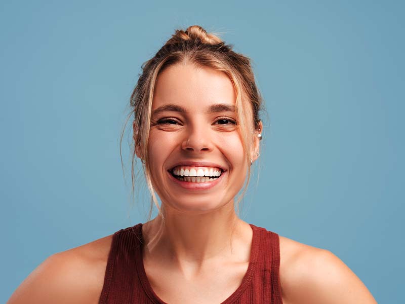 Patients smiling for a dental imaging guide